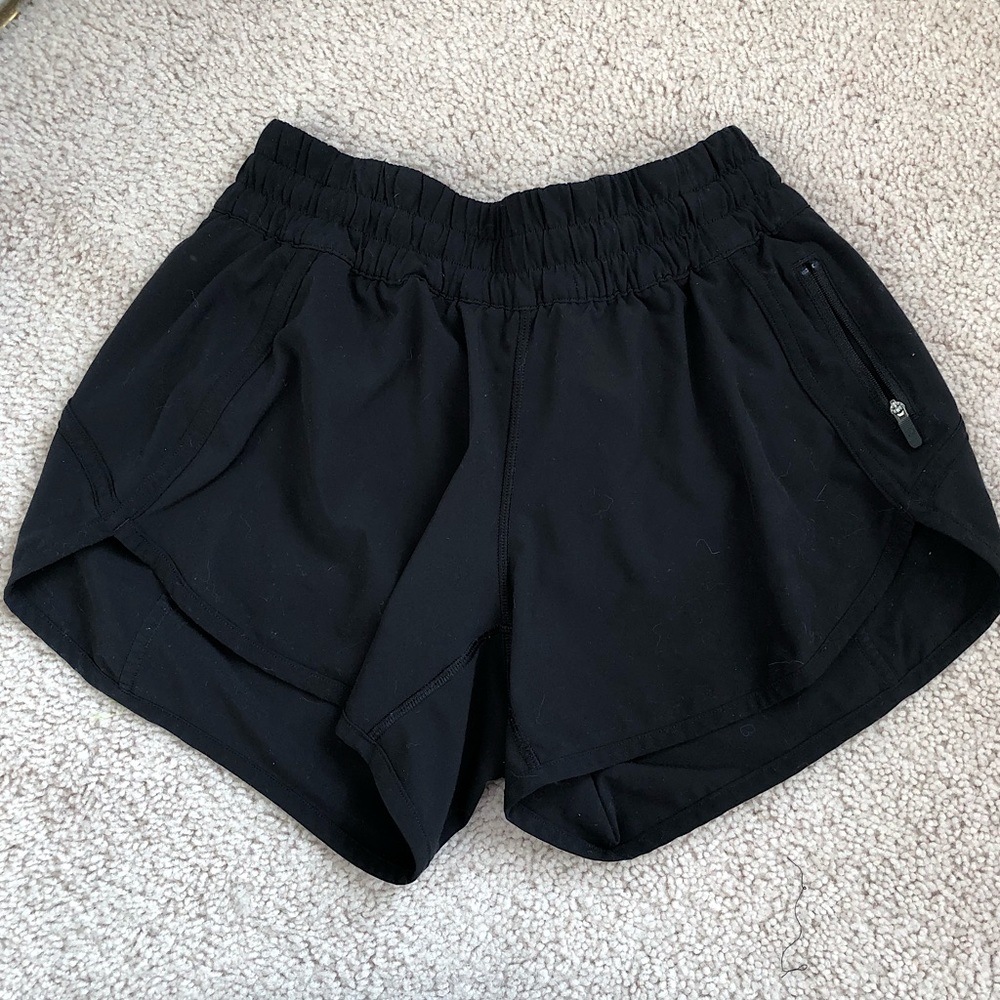 black lululemon 4” tracker shorts